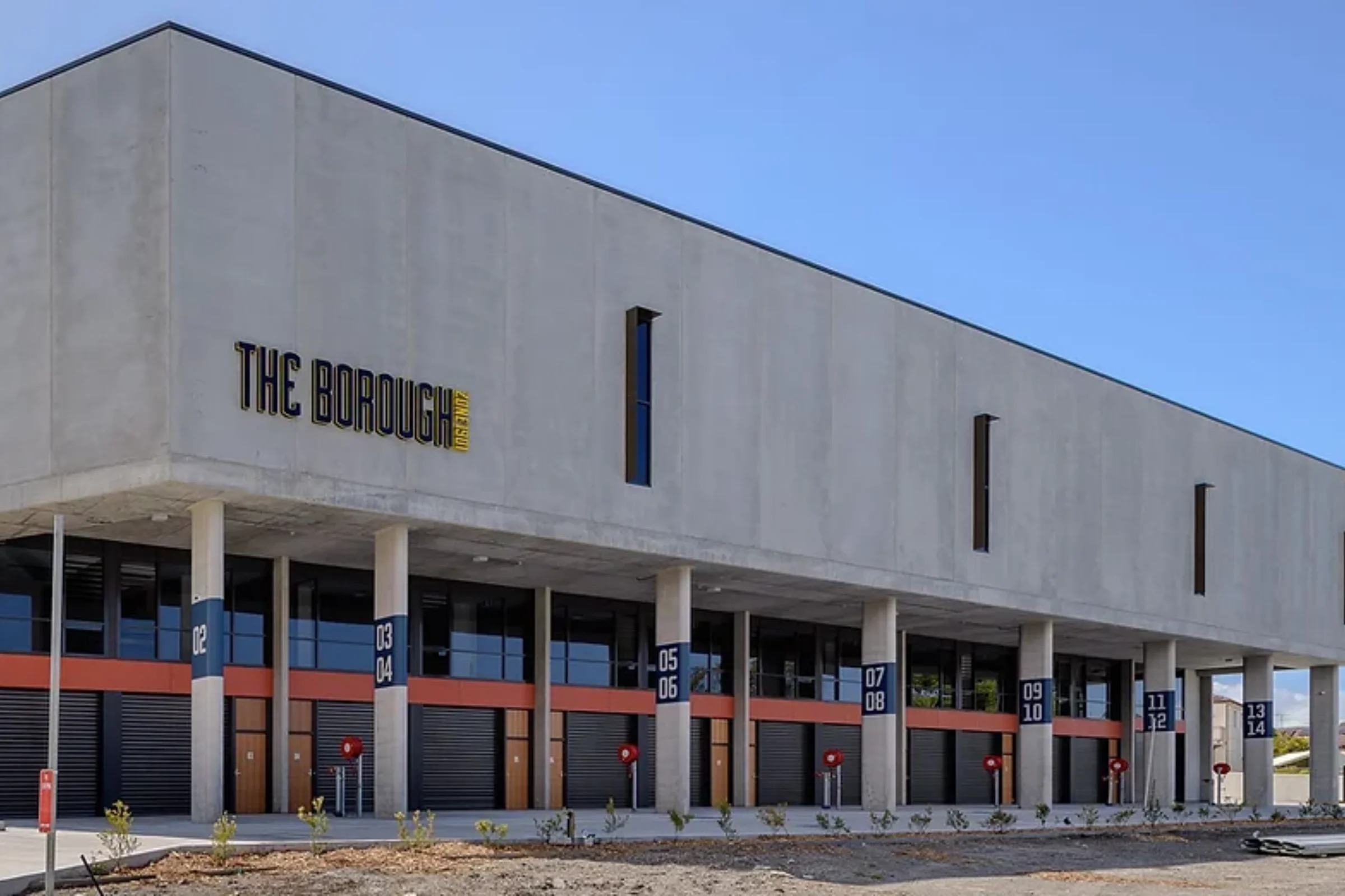 Exterior frontage of The Borough commercial development, Matraville, showing numbered business units